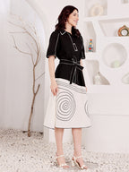 Women's Black And White Spiral Print Dress With Belted Waist